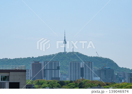 Seoul, South Korea - Apr. 18, 2026 : N Seoul Tower landmark on Namsan Mountain with city skyline, South Korea Seoul, South Korea - Apr. 18, 2026 : N Seoul Tower landmark on Namsan Mountain with city skyline, South Korea 139046974
