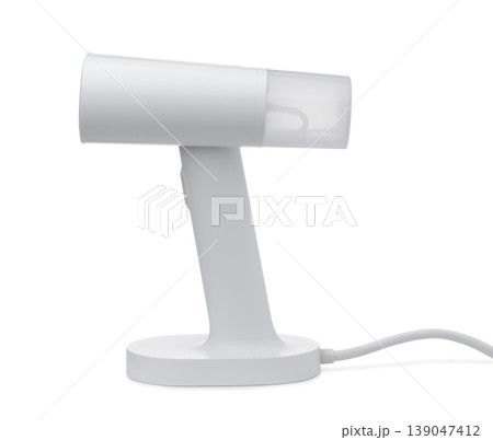 Side view of handheld clothes steamer 139047412