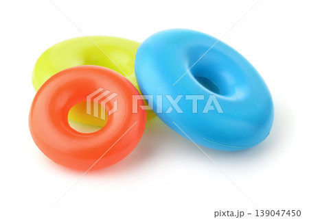 Three colorful plastic toy rings 139047450