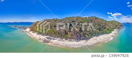 Tropical island coastline with reef and clear water Panama aerial 139047928