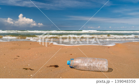 problem of ocean pollution with trash and plastic waste, a close-up of a plastic bottle on the seashore, a poster for Earth Day and environmental concerns problem of ocean pollution with trash and plastic waste, a close-up of a plastic bottle on the seashore, a poster for Earth Day and environmental concerns 139048350