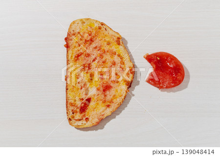a slice of catalan pa amb tomaquet with olive oil a slice of catalan pa amb tomaquet with olive oil 139048414