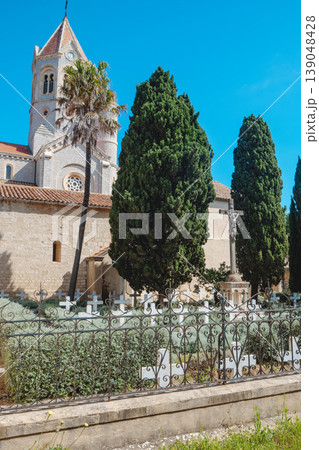cemetery beside Lerins Abbey with white crosses cemetery beside Lerins Abbey with white crosses 139048428