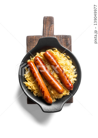 Stewed cabbage, sauerkraut and grilled sausages isolated Stewed cabbage, sauerkraut and grilled sausages isolated 139049977