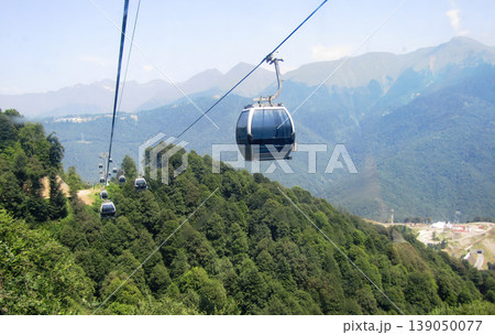 Modern ropeway transportation system in a high altitude mountain resort. 139050077