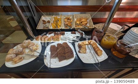 Bread and cakes at breakfast buffet in a hotel Bread and cakes at breakfast buffet in a hotel 139050489