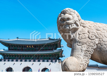 Seoul, South Korea - Apr. 12, 2026 : Haetae Statue and Gwanghwamun Gate under Blue Sky, Seoul, South Korea Seoul, South Korea - Apr. 12, 2026 : Haetae Statue and Gwanghwamun Gate under Blue Sky, Seoul, South Korea 139050527