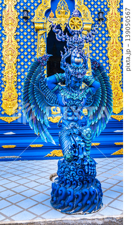 Blue statue of guardian at Wat Rong Suea Ten temple (blue temple) near Chiang Rai city, Thailand Blue statue of guardian at Wat Rong Suea Ten temple (blue temple) near Chiang Rai city, Thailand 139050567