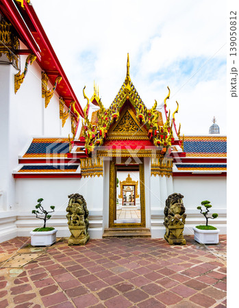 Wat Pho temple in Bangkok city, Thailand. View of pagoda and stupa in famous ancient temple. Religious buildings in buddhism style near Grand Palace. Oriental and Asian style, famous tourist target. 139050812