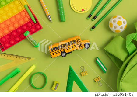 Green School Supplies Flat Lay on Green Background Green School Supplies Flat Lay on Green Background 139051405