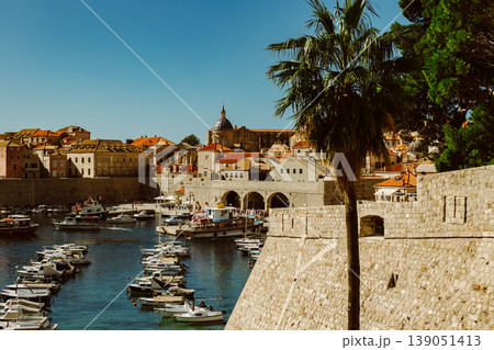Amazing view of Dubrovnik old city and the boats in a marina on a sunny day. Travel destination in Croatia. 139051413