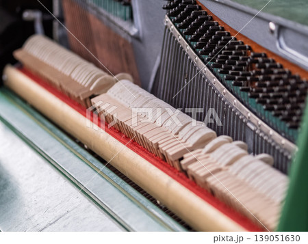 Mechanism of piano inside, closeup. Piano strings 139051630