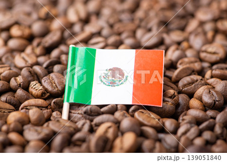 Flag of Mexico in roasted coffee beans. Growing coffee in Mexico concept, origin of coffee grain Flag of Mexico in roasted coffee beans. Growing coffee in Mexico concept, origin of coffee grain 139051840