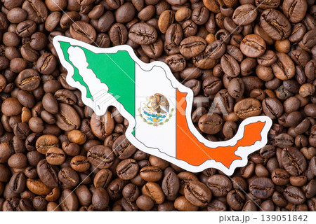 Flag and map of Mexico in roasted coffee beans. Growing coffee in Mexico concept, origin of coffee grain Flag and map of Mexico in roasted coffee beans. Growing coffee in Mexico concept, origin of coffee grain 139051842