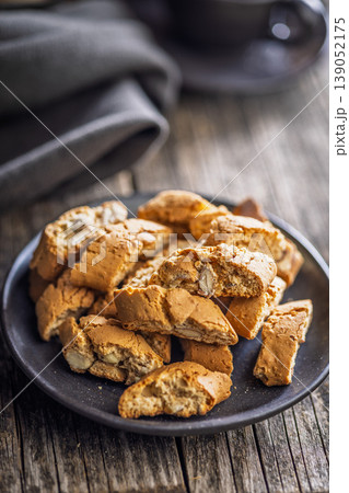Crunchy Almond Biscotti cantuccini on a Rustic Plate, Perfect for Coffee or Tea Breaks Crunchy Almond Biscotti cantuccini on a Rustic Plate, Perfect for Coffee or Tea Breaks 139052175