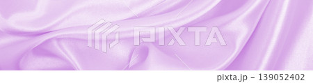 Smooth elegant lilac silk or satin texture as wedding background. Luxurious background design 139052402