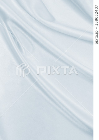Smooth elegant grey silk or satin luxury cloth as wedding background. Luxurious background design Smooth elegant grey silk or satin luxury cloth as wedding background. Luxurious background design 139052407