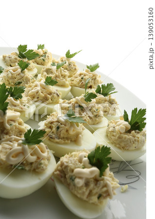 Eggs Raw and Cooked Stuffed Eggs Food Concept Eggs Raw and Cooked Stuffed Eggs Food Concept 139053160