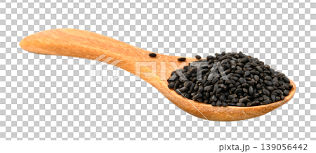 Heap of black basil seeds or nigella seeds on a small wooden spoon isolated. Close-up view of organic superfood spice for healthy cooking and culinary ingredients. Heap of black basil seeds or nigella seeds on a small wooden spoon isolated. Close-up view of organic superfood spice for healthy cooking and culinary ingredients. 139056442
