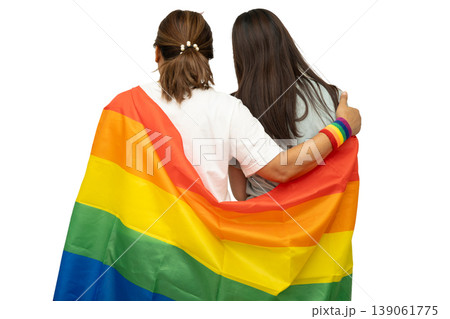 Asian couple woman with LGBT rainbow flag isolated on white background. 139061775
