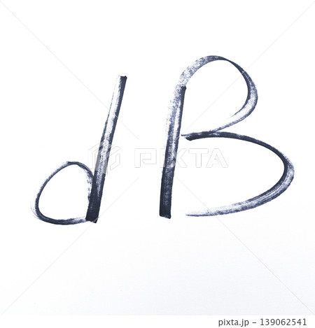 the decibel abbreviation drawn with a black marker 139062541