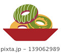 美味しそうに盛られた色鮮やかな抹茶ドーナツ 139062989