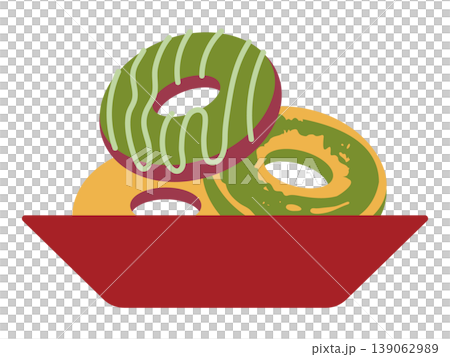 A colorful and delicious-looking plate of matcha donuts. 139062989