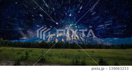 a beautiful night shot of a mountain in the night starry sky 139063253