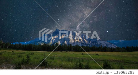 a beautiful night shot of a mountain in the night starry sky a beautiful night shot of a mountain in the night starry sky 139063285