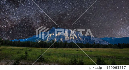 a beautiful night shot of a mountain in the night starry sky a beautiful night shot of a mountain in the night starry sky 139063317