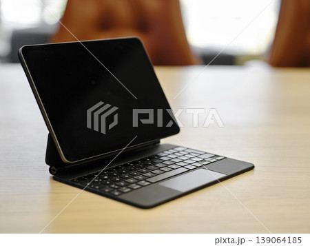 a tablet computer on the table a tablet computer on the table 139064185