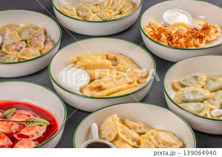 vareniki dumplings assortment different types with sauces top view food set 139064940