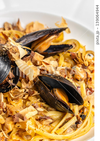 pasta mussels seafood noodles close up dish with shellfish and garnish pasta mussels seafood noodles close up dish with shellfish and garnish 139064944
