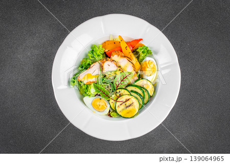 Chicken salad with vegetables and egg healthy protein lunch bowl top view Chicken salad with vegetables and egg healthy protein lunch bowl top view 139064965
