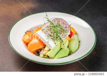 Cheese salad with vegetables and sprouts on plate Cheese salad with vegetables and sprouts on plate 139065001