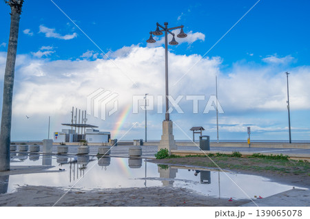 Rainbow over the Valencia Beach Promenade in Spain 139065078