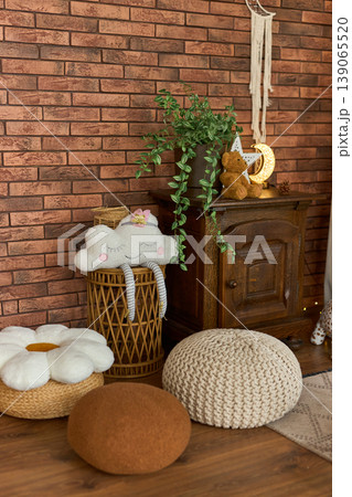 Cozy Kids Room Corner with Brick Wall and Poufs 139065520