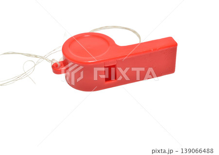 Red plastic whistle with a cord. Red plastic whistle with a cord. 139066488
