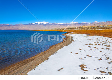 Karakul lake in the Pamir Mountains in Tajikistan Karakul lake in the Pamir Mountains in Tajikistan 139068348