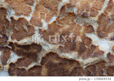 Cracked texture of tiger loaf bread Cracked texture of tiger loaf bread 139069538