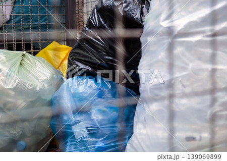 Plastic bottles and containers prepared for recycling Plastic bottles and containers prepared for recycling 139069899