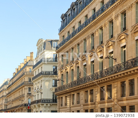 Haussmann buildings lining a Paris street, showcasing classic European architecture and urban elegance 139072938
