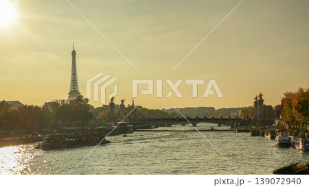 Eiffel Tower and Seine river at sunset, with Pont Alexandre III and tour boats in Paris, France Eiffel Tower and Seine river at sunset, with Pont Alexandre III and tour boats in Paris, France 139072940