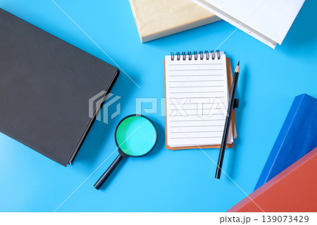 A book note with pen and hard cover books,Back to school concept. A book note with pen and hard cover books,Back to school concept. 139073429