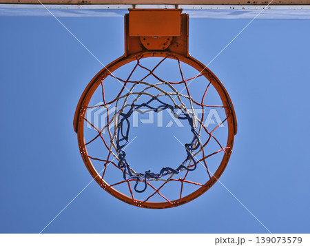 basketball hoop and blue sky basketball hoop and blue sky 139073579