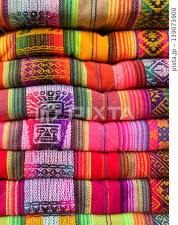 Northern Aguayo in different colours.Aboriginal weavings in Tilcara,Salta 139073900