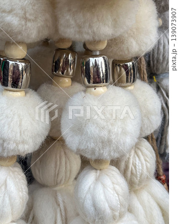 White handmade pompoms.Purmamarca market in Jujuy, Argentina. 139073907