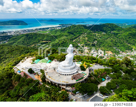 Aerial View drone shot of Big Buddha Statue on the high mountain at Phuket thailand Aerial View drone shot of Big Buddha Statue on the high mountain at Phuket thailand 139074888