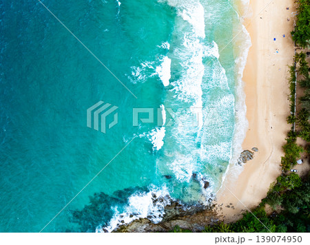 Beautiful wave crashing on sandy shore at beach in phuket thailand 139074950