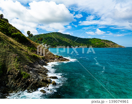 Aerial flying drone view seashore waves water surface texture in sunny tropical ocean at Phuket island Thailand Aerial flying drone view seashore waves water surface texture in sunny tropical ocean at Phuket island Thailand 139074961